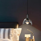 Luminara | Elegant Black Glass Pendant Light with Brass Accents 3